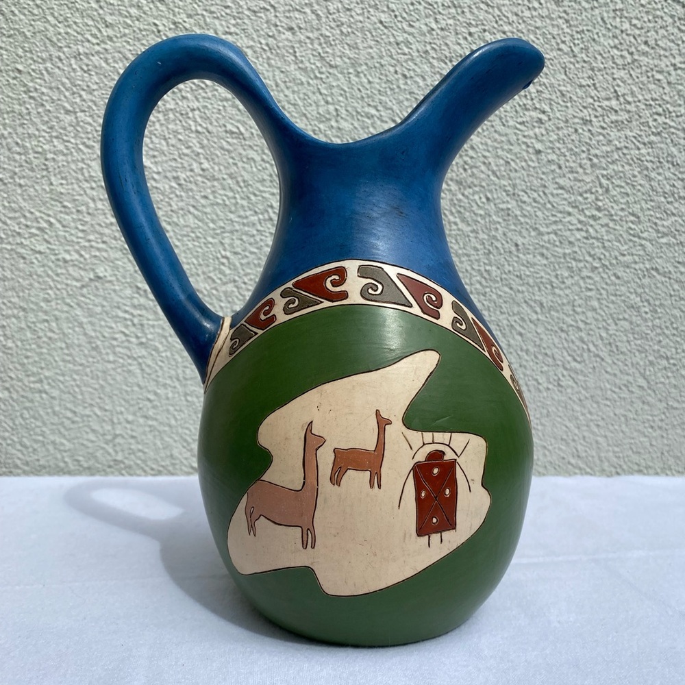 Hand Painted vintage pitcher/jug from Chile. 9-1/2” tall